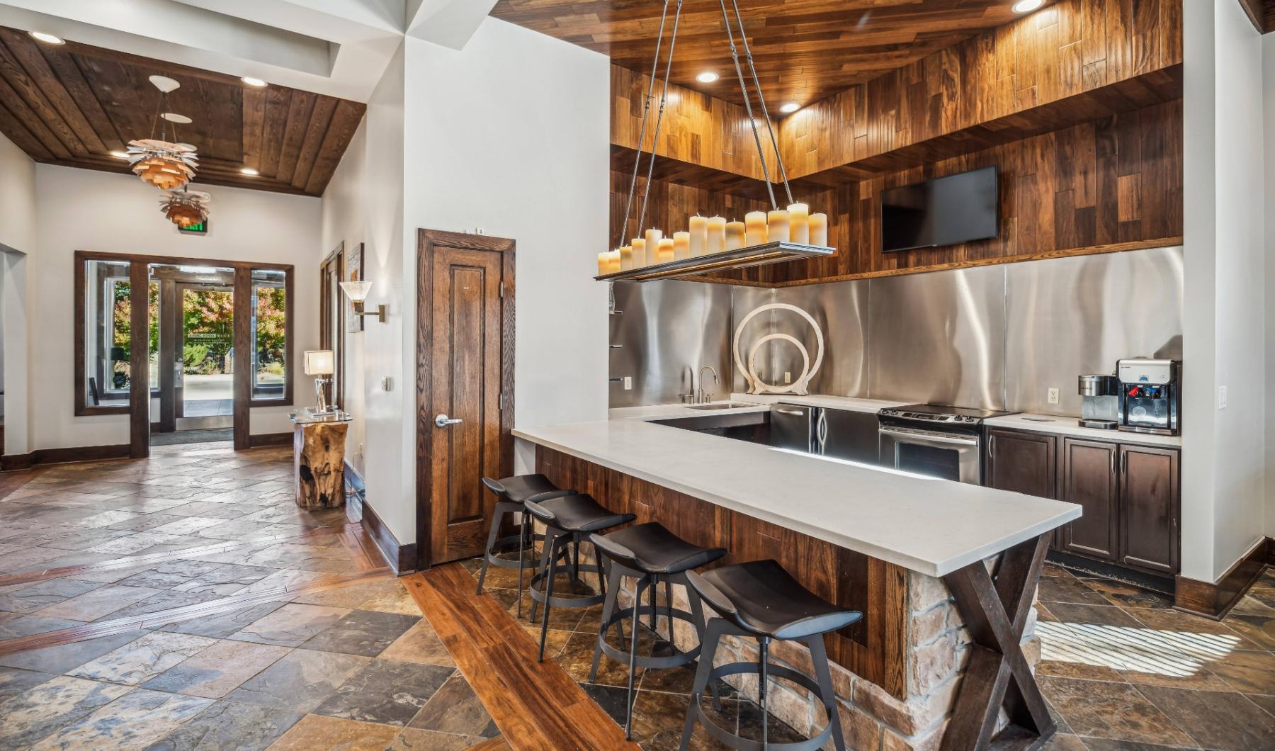 The essence of exceptional living a kitchen with a bar and stools