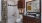 a bathroom with a tub sink and toilet