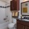 a bathroom with a tub sink and toilet