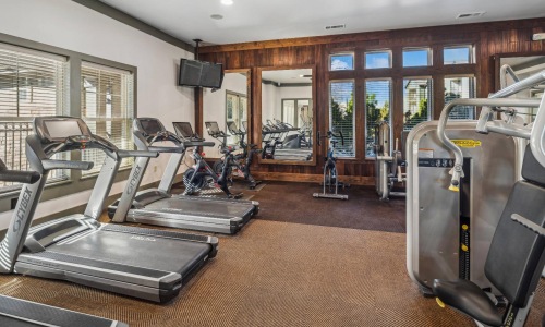 Quick access to state-of-the-art amenities a gym with exercise equipment